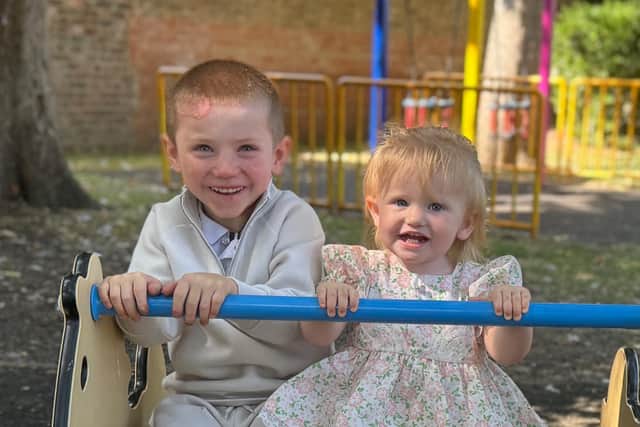 Clay pictured with his little sister Ocean, who did not inherit the condition.