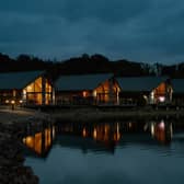 Night falls on Landal Twin Lakes, a stunning lakeside retreat alive with wildlife, awash with natural beauty.