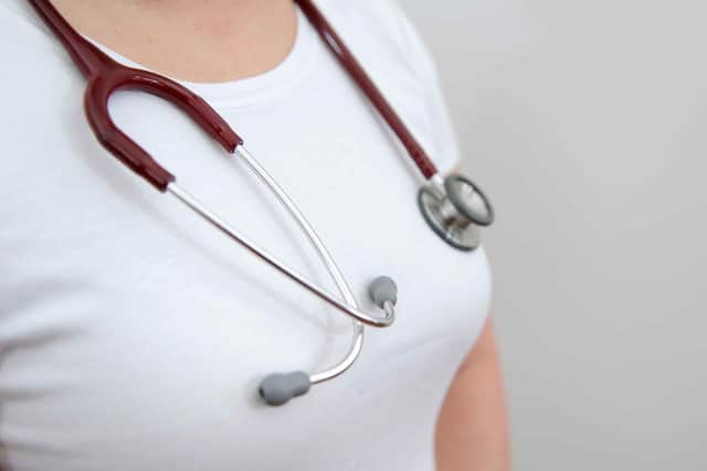 File photo dated 25/01/2013 of a model posing with a stethoscope around her neck. GPs are facing "insurmountable pressures", experts have said as they warned that the NHS "will not survive" without general practice. Issue date: Friday March 10, 2023.