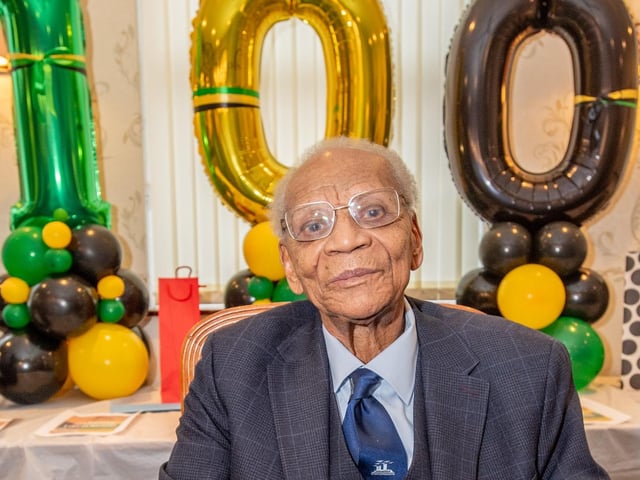 Ralph Ottey, of Boston, celebrating his 100th birthday at the Boston & County Club.