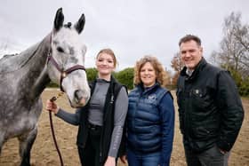 Donna Barker of DB Equine Therapy pictured with Ebony Douce, horse, Ringo and Steve Lyon of UKSE.