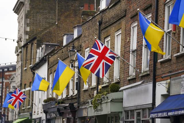 Ukrainian flags are flown from properties in Church Street, Twickenham in southwest London, following Russia's invasion of Ukraine. Picture date: Wednesday March 2, 2022.