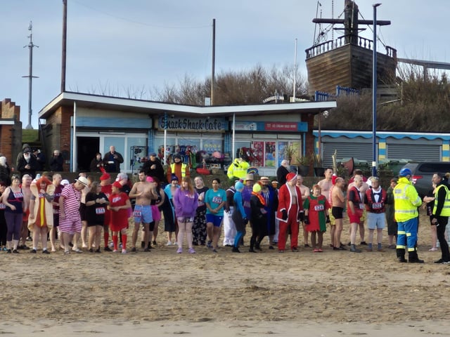 Gearing up with the safety briefing before the dip. Photo: Carl Tebbutt