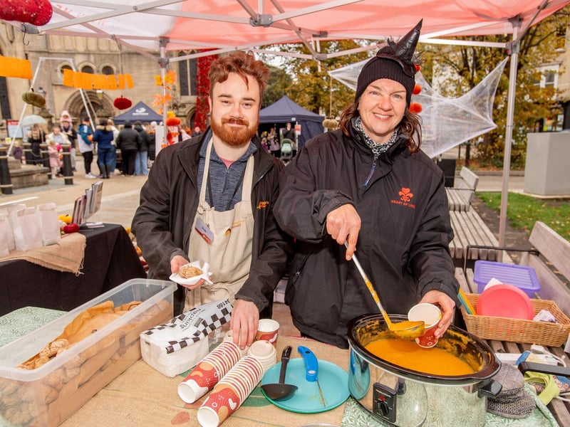 Robert Pratt and Emma Clark at Cogglesford Watermill's stall serving homemade pumpkin soup. Photo: NKDC/John Aron Photography