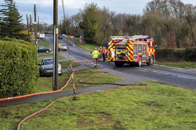 Firefighters pumping out the flooded properties in Metheringham. Photo: Holly Parkinson