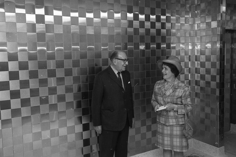 Coun Margaret Haworth with Mr R. W. D. Hydes, managing director of Stainless Steel Tile Company, of Sheffield, suppliers of the small, stainless steel tiles.