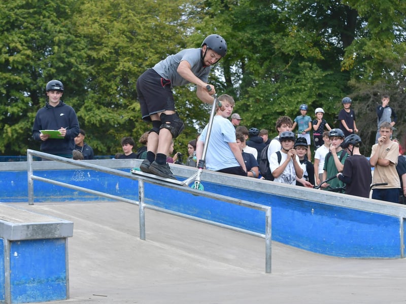 George Thompson, grinds his scooter.