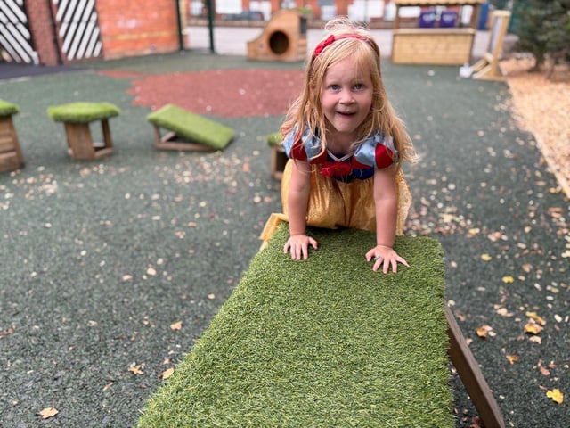 child using the new play apparatus