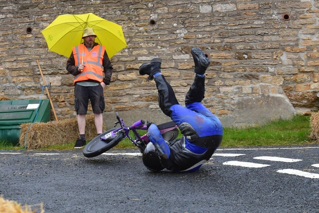 'Purple' gravity biker takes a tumble at the Coleby Down Challenge.