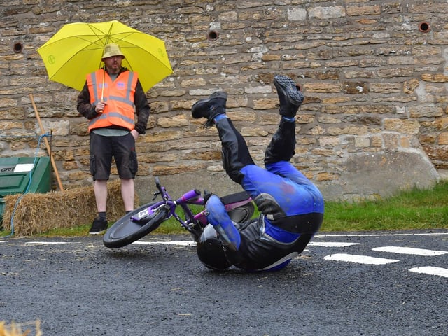 'Purple' gravity biker takes a tumble at the Coleby Down Challenge.