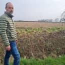 No Pylons Lincolnshire campaigner Peter Phillips at a field in Burgh le Marsh that could be a site for pylons.