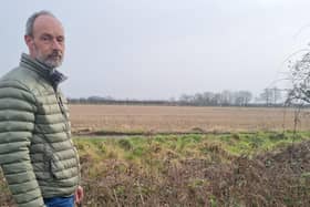 No Pylons Lincolnshire campaigner Peter Phillips at a field in Burgh le Marsh that could be a site for pylons.