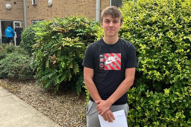 Ben Jones collects his GCSE results at Carre's.