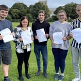 Bailey Faulkner, Lacey Newton, Jamie Monks, Gabriella Bedford and Hubert Bulkowy collect their results at the Giles Academy, Old Leake.