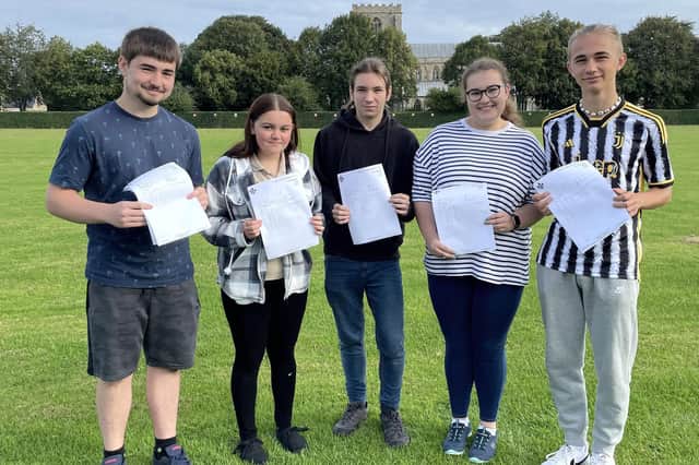 Bailey Faulkner, Lacey Newton, Jamie Monks, Gabriella Bedford and Hubert Bulkowy collect their results at the Giles Academy, Old Leake.