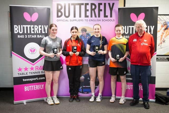 Ella (centre) at Butterfly National Schools Championships
