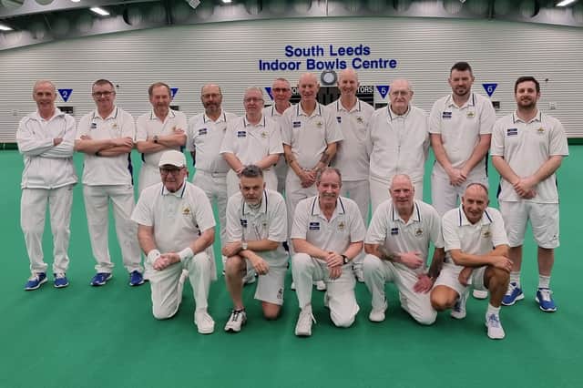 The Denny Plate team are pictured with national umpire Les Smith.