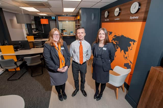 From left: Abbi Wilson, Travel Consultant; Marc Butler, Travel Branch Manager; and Lucy Myers, Assistant Manager in the new look travel shop