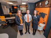 From left: Abbi Wilson, Travel Consultant; Marc Butler, Travel Branch Manager; and Lucy Myers, Assistant Manager in the new look travel shop