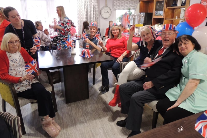 Staff and guests at the Holdingham Grange care home coronation celebration.