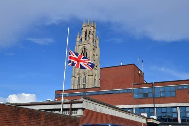 The Union Flag flying at half mast over Boston Police Station.