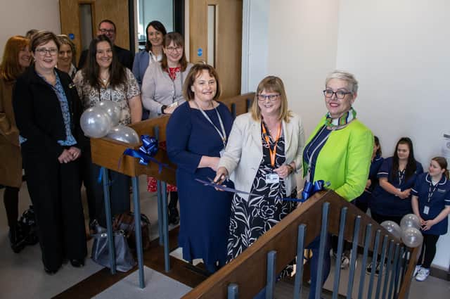 Performing the ribbon cutting is Sandra Williamson, Chief Operating Officer - East Locality NHS Lincolnshire CCG.