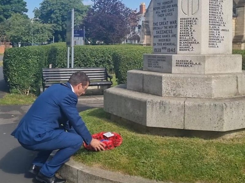 Mayor of Skegness Coun Adrian Findley laying a wreath.
