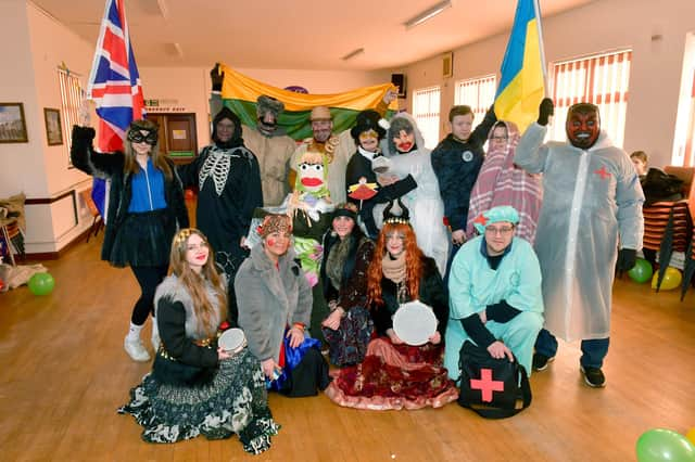 Festival participants get ready to head out on the procession through town.