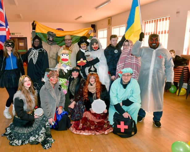 Festival participants get ready to head out on the procession through town.