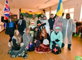 Festival participants get ready to head out on the procession through town.