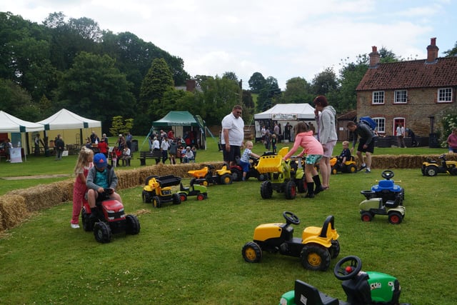 Young children had their own farm machinery to play on