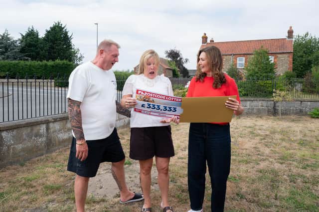 The driving duo were surprised by lottery’s Judie McCourt.
