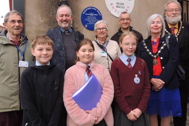 Guests and Civic Trust members at the unveiling including Rev Dominic Grant (third from left) Mayor Coun David Suiter and Deputy Mayor Coun Alison Snookes. Photo: AH