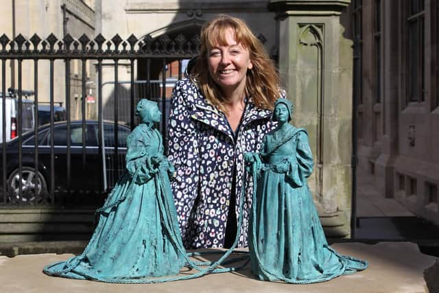 Artist Rachel Carter with the sculpture.