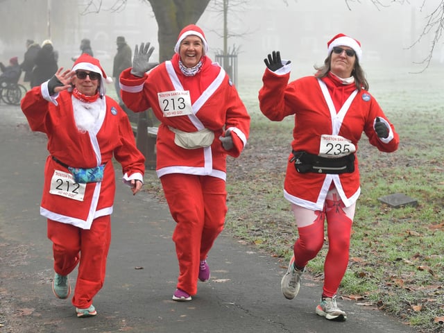 Action from this year's Boston Santa Run.