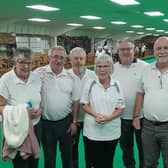 The Parthians and Breakaways bowlers after Parthians won 18-7 with Parthians skip Richard Keeling (far right), pin Nic Woods (next to him), and lead Ray Moore (fourth from right)