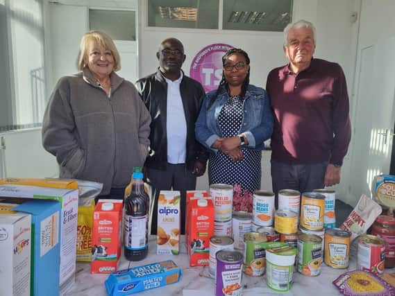 Pastor Dr Olusegun and Mrs Faith Odumade (centre) of the Skegness TSF church with members Maureen and Anthony Eley at the food bank.
