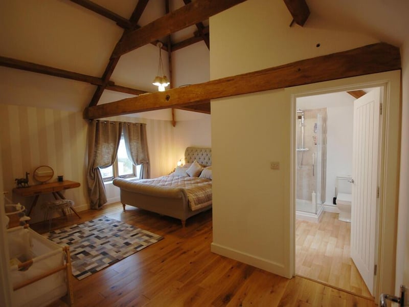 One of the two upstairs bedrooms.