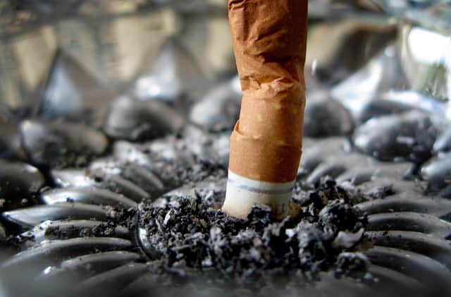 Generic stock picture of a cigarette stubbed out in an ashtray.
