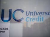 EMBARGOED TO 0001 SUNDAY JANUARY 8 File photo dated 06/10/2021 of a Universal Credit sign on a door of a job centre plus in east London. Universal Credit deductions will leave some Scots struggling despite a promised benefits uplift, a leading charity has warned. Issue date: Monday January 9, 2023.