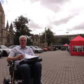 Anthony Henson gathering signatures for his petition in Sleaford Market Place.