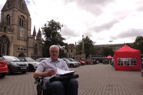 Anthony Henson gathering signatures for his petition in Sleaford Market Place.