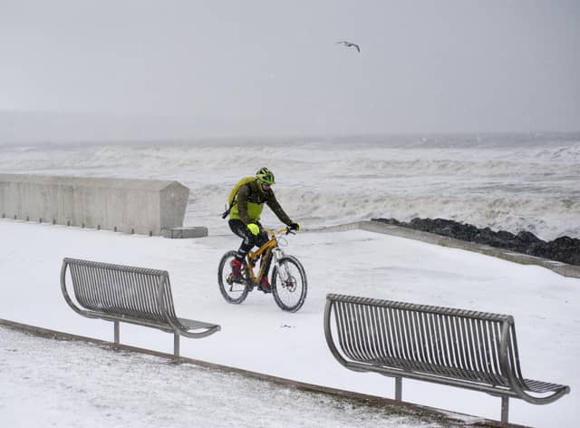A brave cyclist takes a trip along the Prom in Kirkcaldy during the ‘Beast from the East’ weather in February 2018.