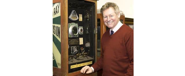 James Taylor with the 1931 ‘Green Ray Television’ machine. Image: Taylors