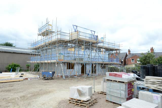 Work underway on Caxton Place, Boston.