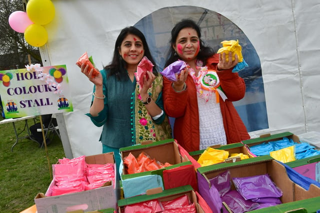 Megha Valecha and Poonam Panjwani man the coloured powders stall at Boston's Central Park.