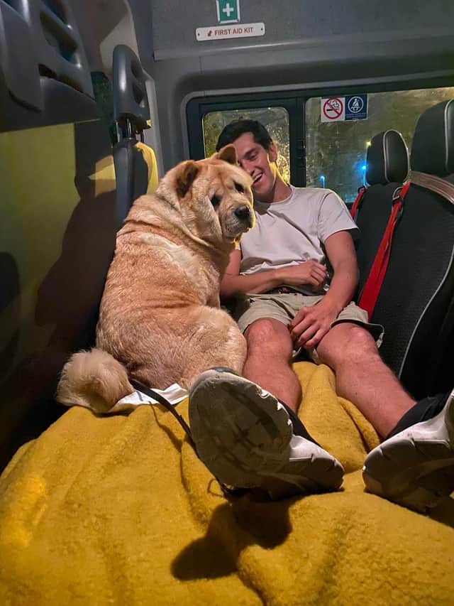 Jony with Mr Poops on the bus back to the UK.