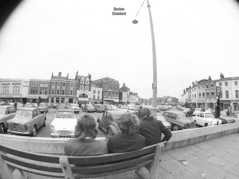 Looking across the Market Place towards Marks & Spencer and other businesses.