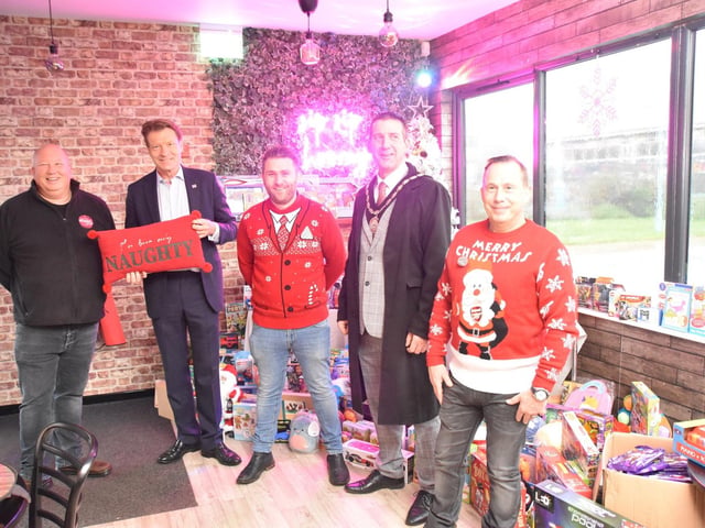 Volunteers with MP Richard Tive and Mayor Coun Adrian Findley at The Hideout Cafe and Bar. Credit: Barry Robinson