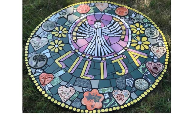 The mosaic artwork in tribute to Lilia Valutyte created by Karen Francesca, of Boston School of Mosaic.